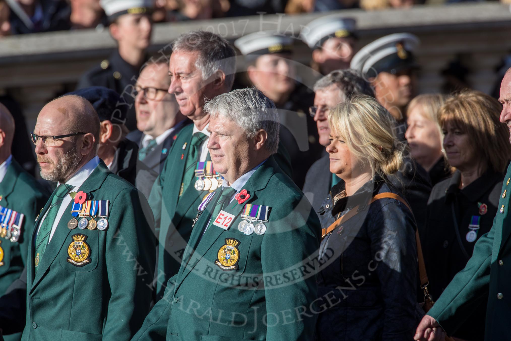 Fleet Air Arm Junglies Association  (Group E12, 22 members) during the Royal British Legion March Past on Remembrance Sunday at the Cenotaph, Whitehall, Westminster, London, 11 November 2018, 11:43.