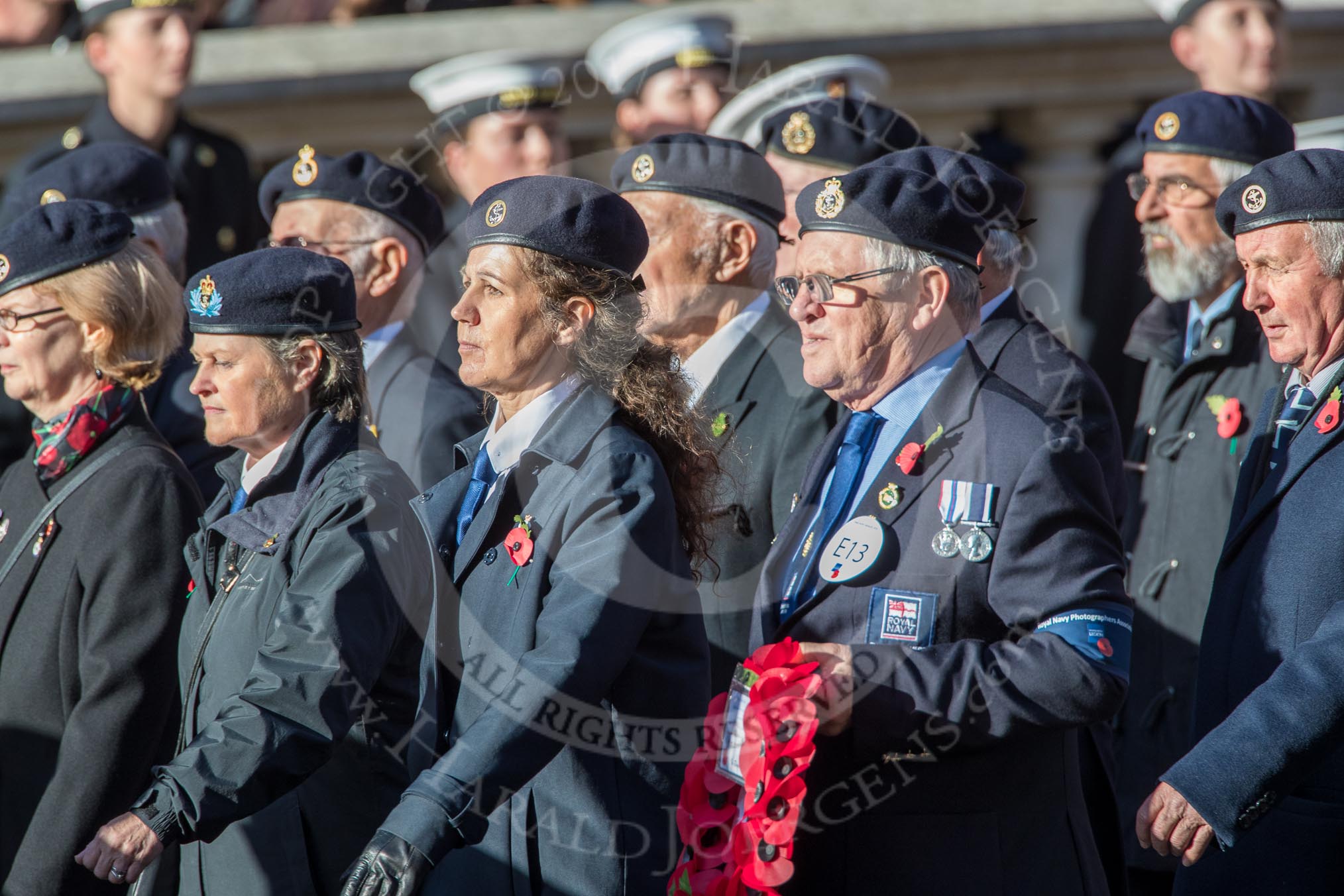 Royal Navy Photographers Association  (Part of the Fly Navy Federation conti (Group E13, 23 members) during the Royal British Legion March Past on Remembrance Sunday at the Cenotaph, Whitehall, Westminster, London, 11 November 2018, 11:43.