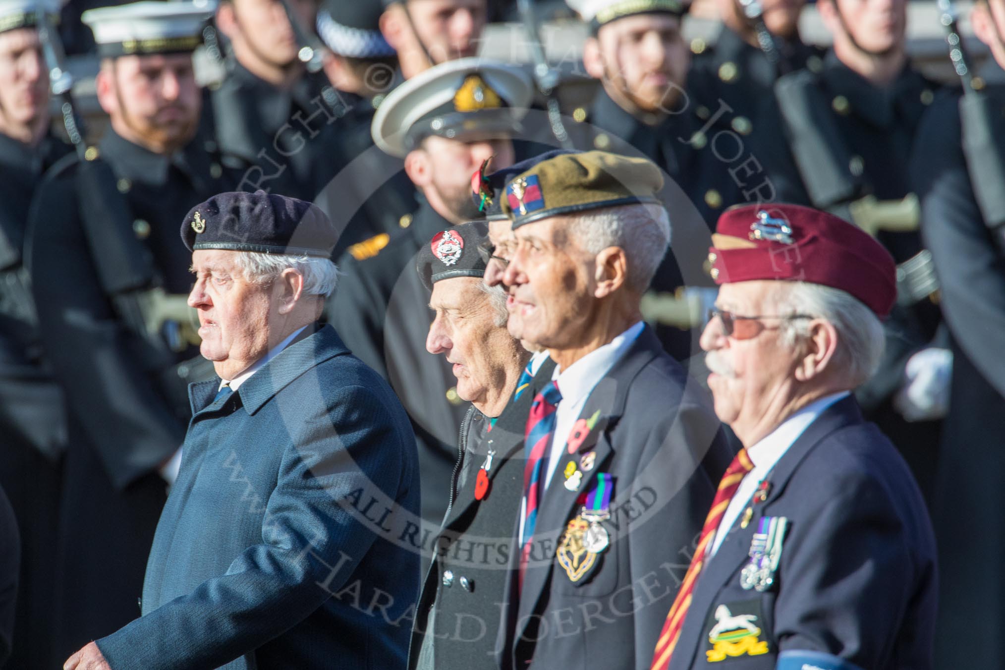 National Service Veterans Alliance (Group F8, 19 members) during the Royal British Legion March Past on Remembrance Sunday at the Cenotaph, Whitehall, Westminster, London, 11 November 2018, 11:51.