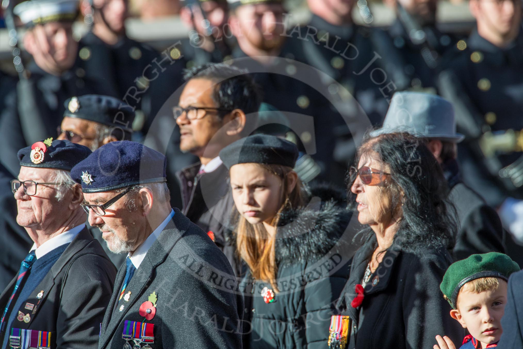 National Malay and Borneo Veterans Association  (Group F12, 76 members) during the Royal British Legion March Past on Remembrance Sunday at the Cenotaph, Whitehall, Westminster, London, 11 November 2018, 11:51.