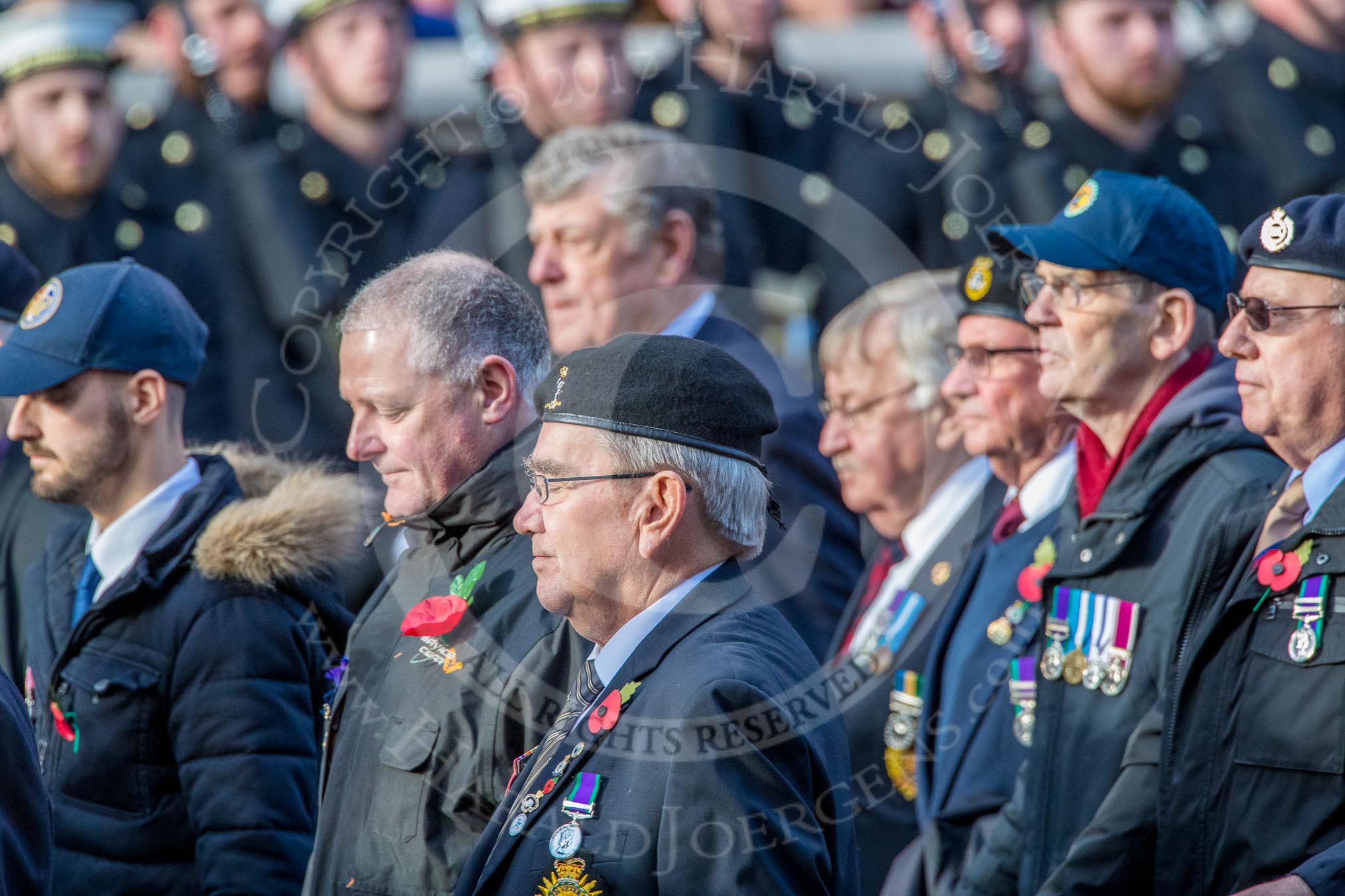 Aden Veterans Association (Group F16, 53 members) during the Royal British Legion March Past on Remembrance Sunday at the Cenotaph, Whitehall, Westminster, London, 11 November 2018, 11:52.