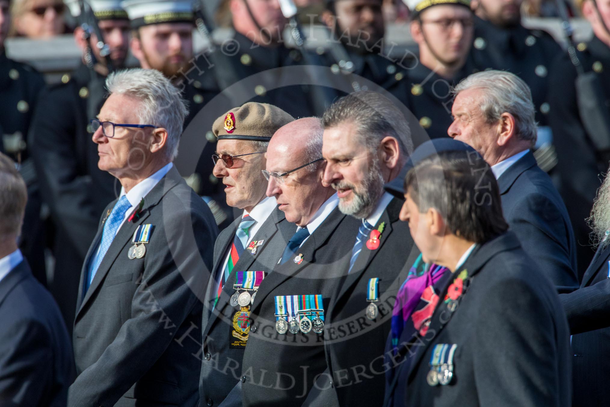 The South Atlantic Medal Association 1982 (Group F17, 150 members) during the Royal British Legion March Past on Remembrance Sunday at the Cenotaph, Whitehall, Westminster, London, 11 November 2018, 11:52.