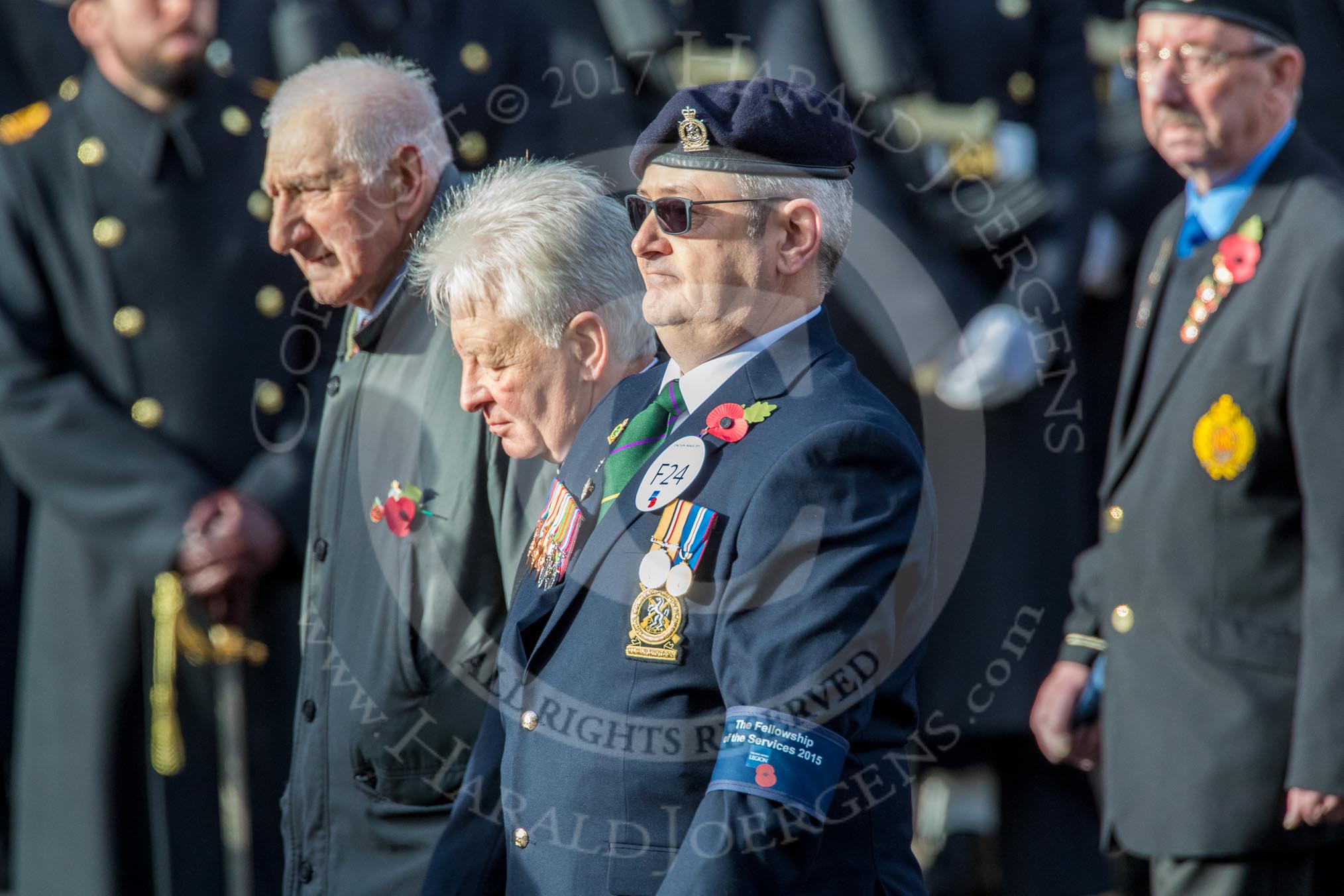 The Fellowship of the Services 2015 (Group F24, 23 members) during the Royal British Legion March Past on Remembrance Sunday at the Cenotaph, Whitehall, Westminster, London, 11 November 2018, 11:53.