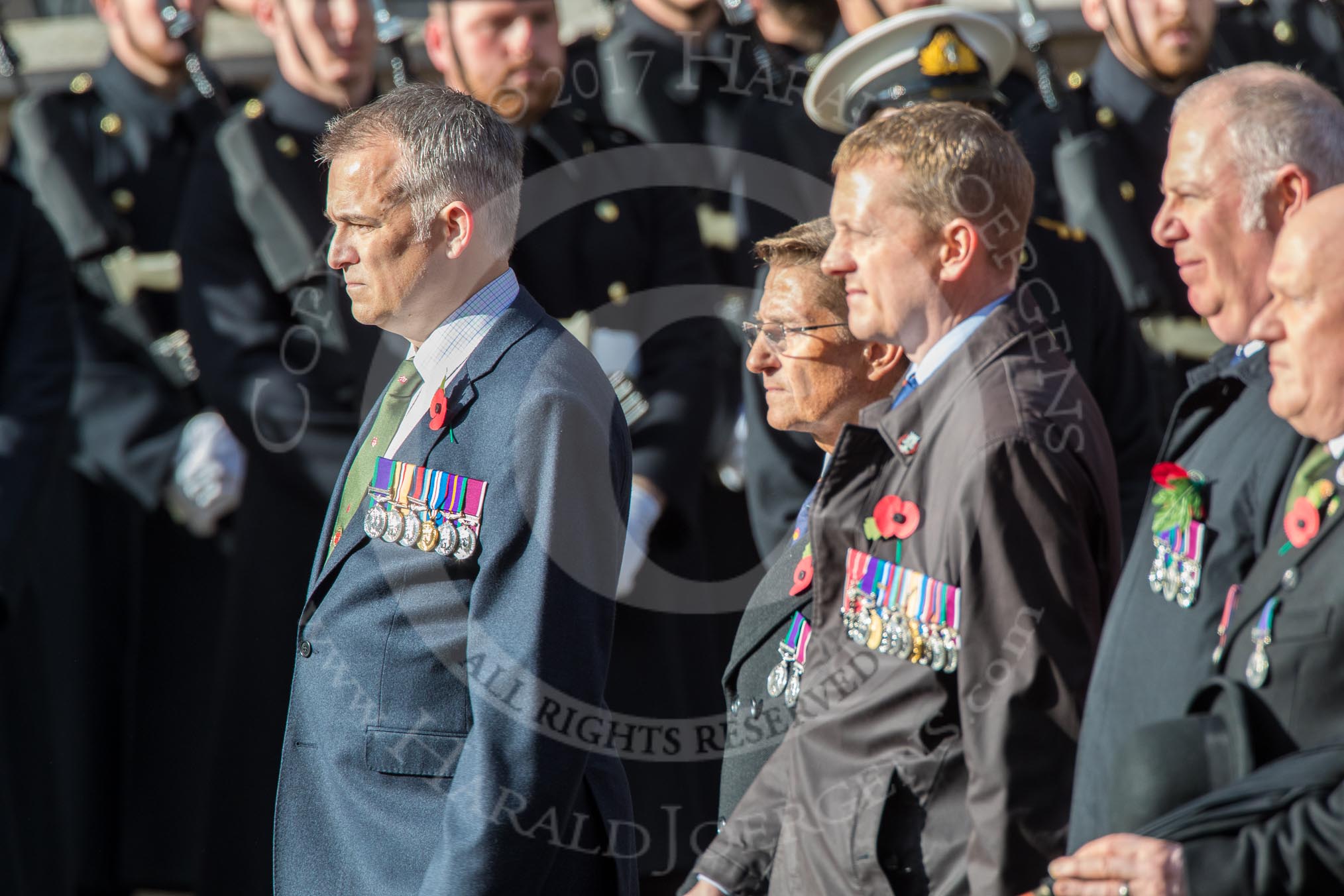 The Cheshire and North Wales Volunteer Decoration and Long Service Medallist’s Association (Group F29, 24 members) during the Royal British Legion March Past on Remembrance Sunday at the Cenotaph, Whitehall, Westminster, London, 11 November 2018, 11:54.