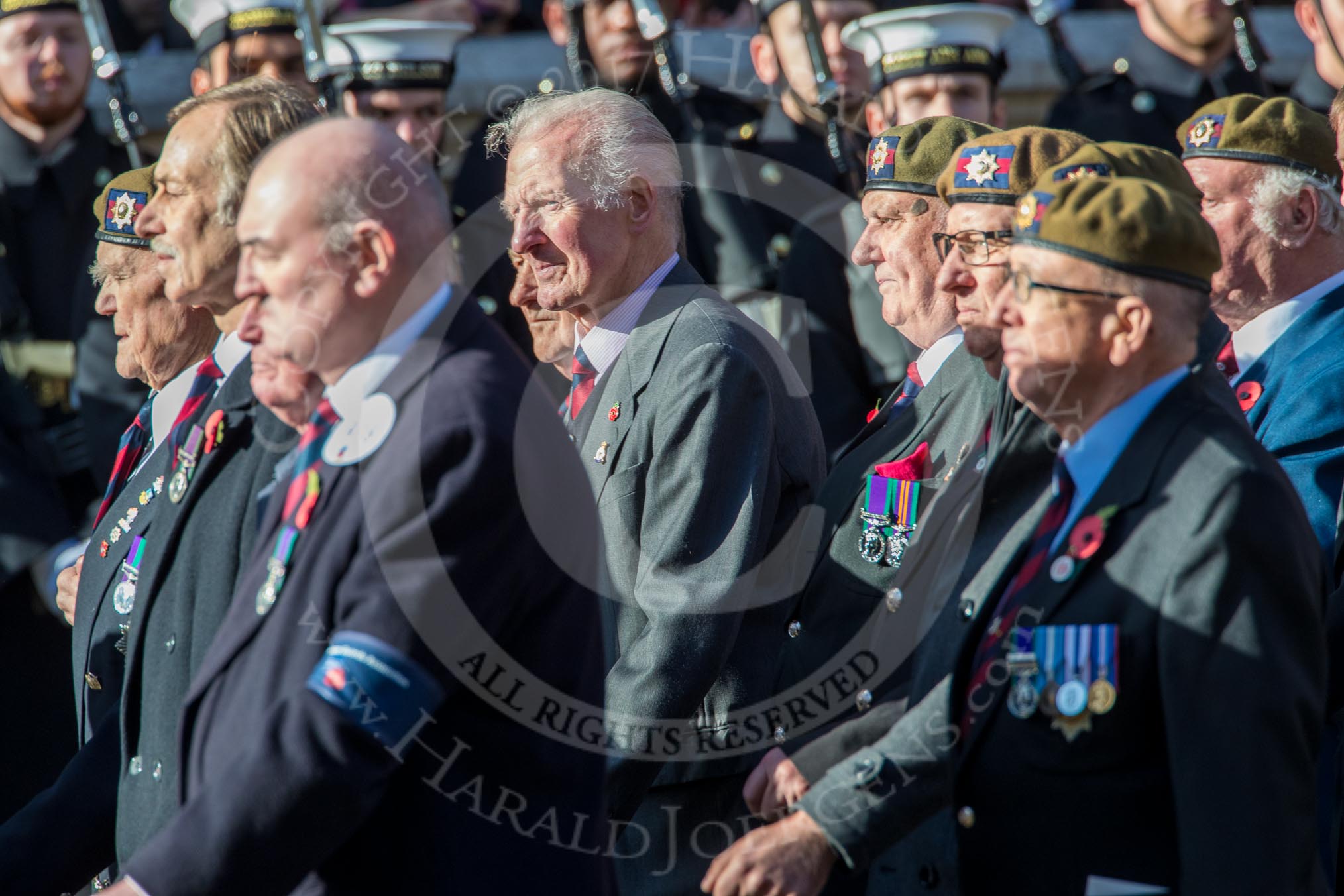 Coldstream Guards Association (Group A18, 30 members) during the Royal British Legion March Past on Remembrance Sunday at the Cenotaph, Whitehall, Westminster, London, 11 November 2018, 11:59.