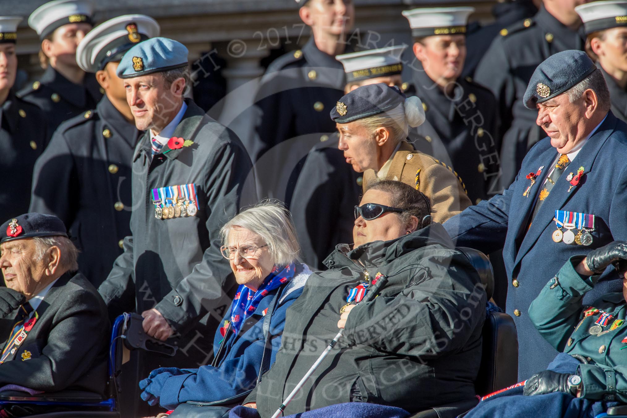 Blind Veterans UK (Group AA7, 215 members) during the Royal British Legion March Past on Remembrance Sunday at the Cenotaph, Whitehall, Westminster, London, 11 November 2018, 12:05.