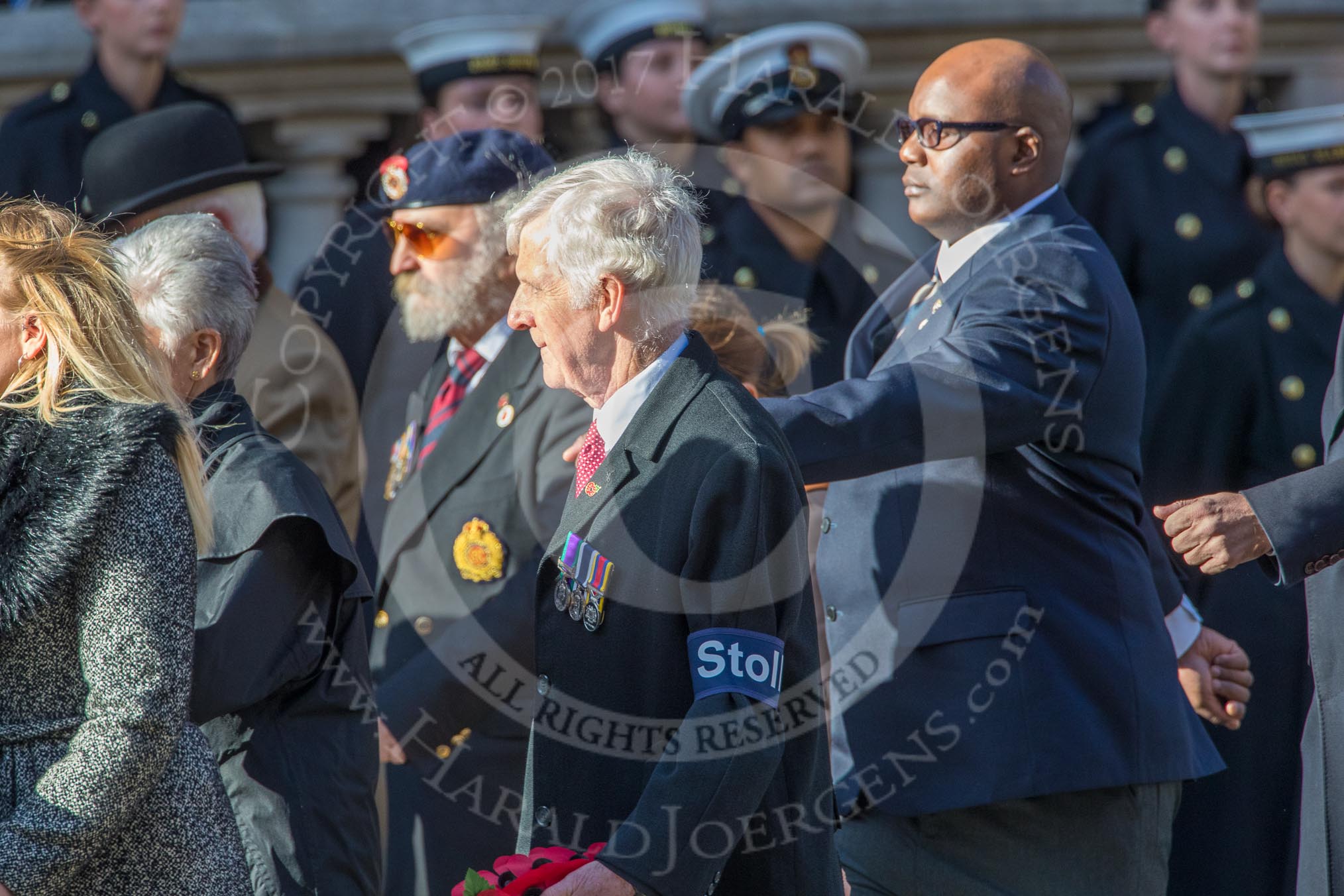 Stoll (Group D3, 18 members) during the Royal British Legion March Past on Remembrance Sunday at the Cenotaph, Whitehall, Westminster, London, 11 November 2018, 12:20.