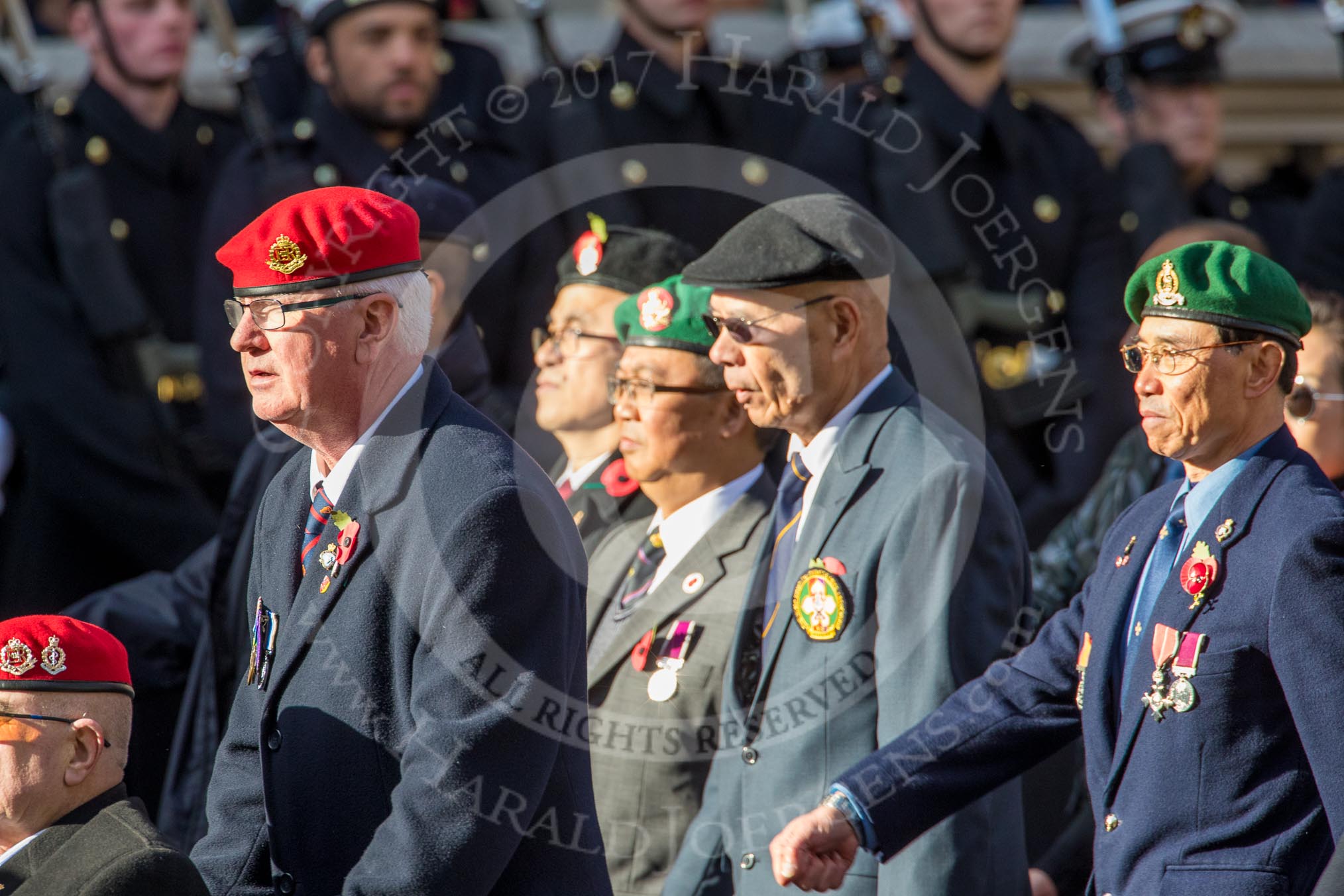 The Hong Kong Ex-Servicemen's Association  (UK Branch) (Group D22, 24 members) during the Royal British Legion March Past on Remembrance Sunday at the Cenotaph, Whitehall, Westminster, London, 11 November 2018, 12:24.
