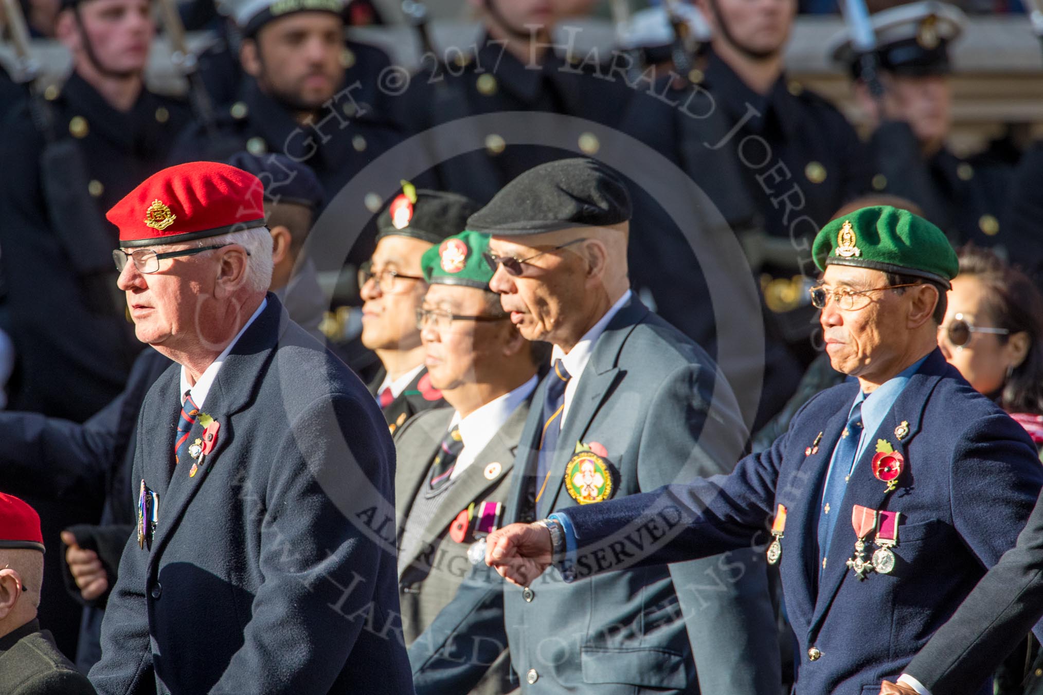 The Hong Kong Ex-Servicemen's Association  (UK Branch) (Group D22, 24 members) during the Royal British Legion March Past on Remembrance Sunday at the Cenotaph, Whitehall, Westminster, London, 11 November 2018, 12:24.