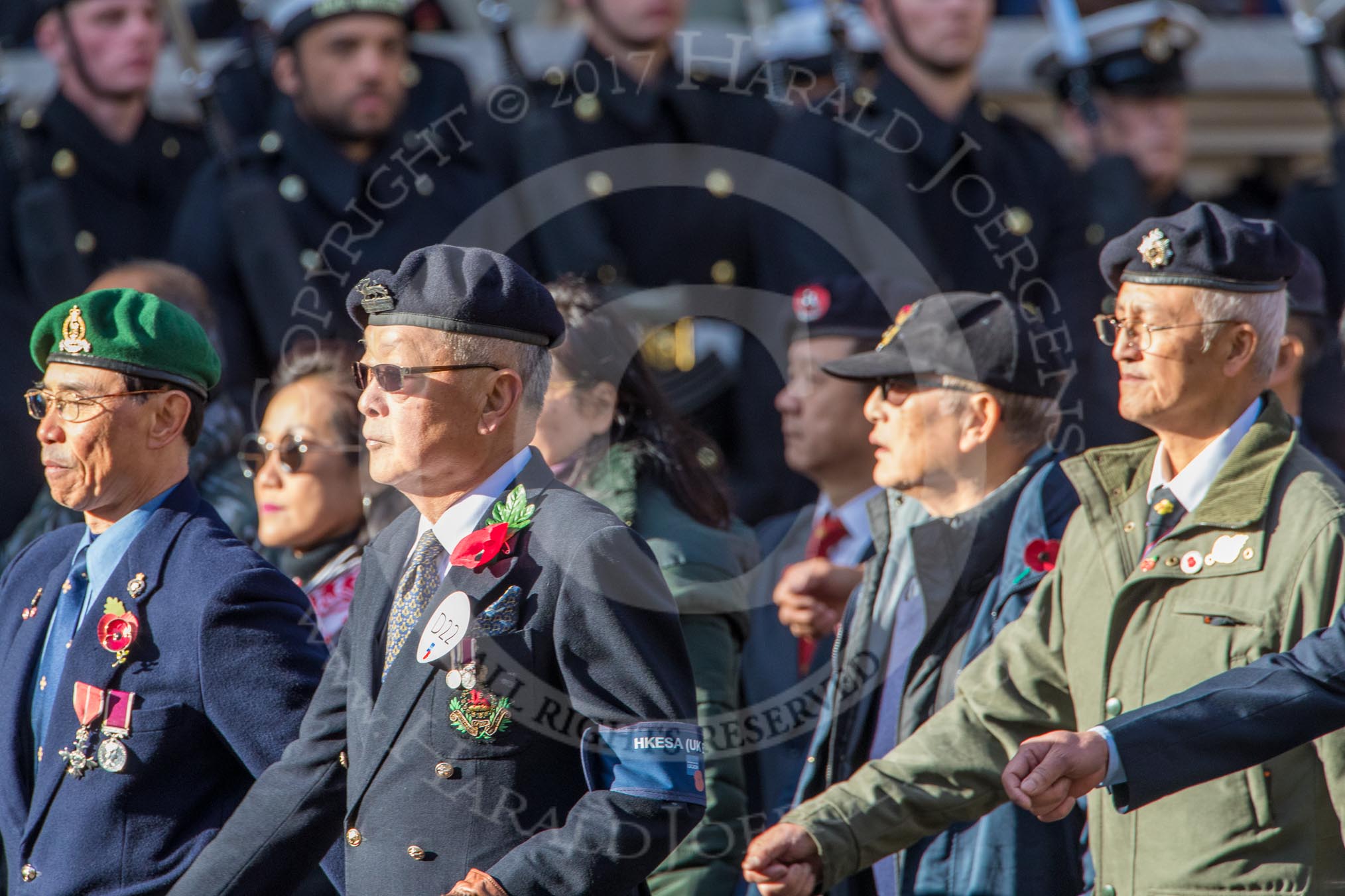 The Hong Kong Ex-Servicemen's Association  (UK Branch) (Group D22, 24 members) during the Royal British Legion March Past on Remembrance Sunday at the Cenotaph, Whitehall, Westminster, London, 11 November 2018, 12:24.