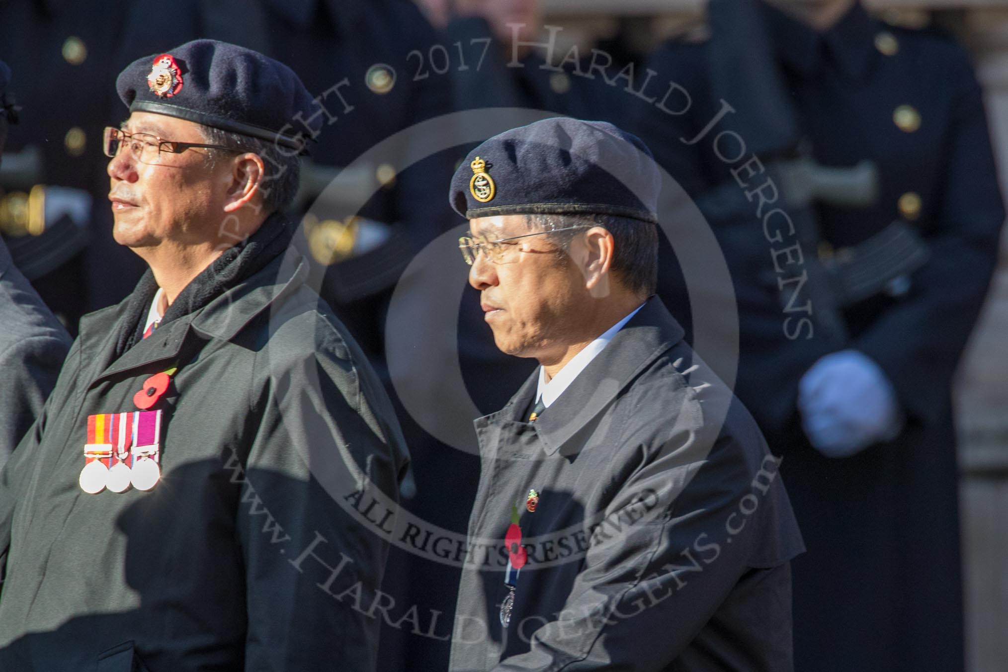 The Hong Kong Ex-Servicemen's Association  (UK Branch) (Group D22, 24 members) during the Royal British Legion March Past on Remembrance Sunday at the Cenotaph, Whitehall, Westminster, London, 11 November 2018, 12:24.