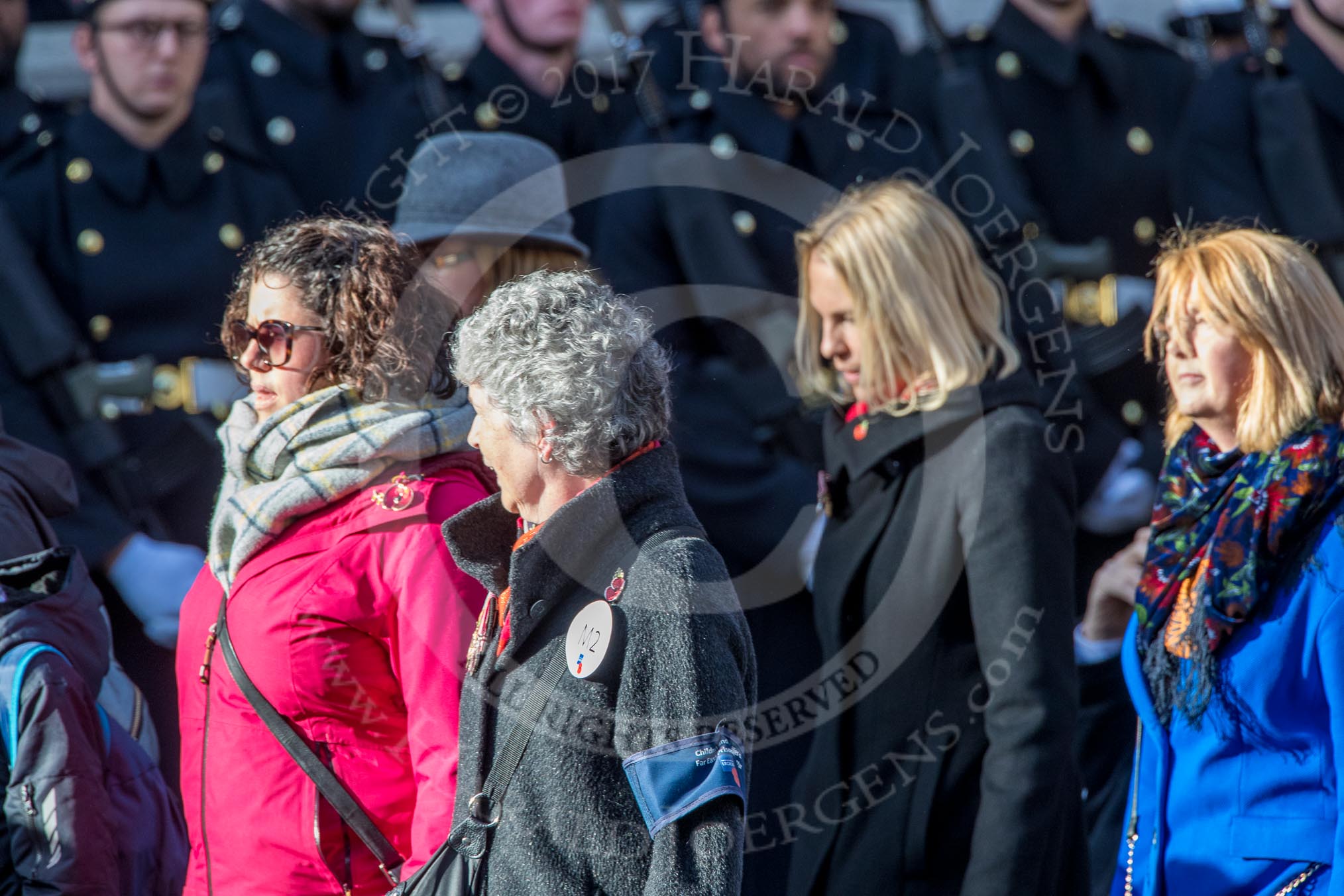 Children (and Families) of Far East Prisoners of War (Group M2, 59 members) during the Royal British Legion March Past on Remembrance Sunday at the Cenotaph, Whitehall, Westminster, London, 11 November 2018, 12:25.