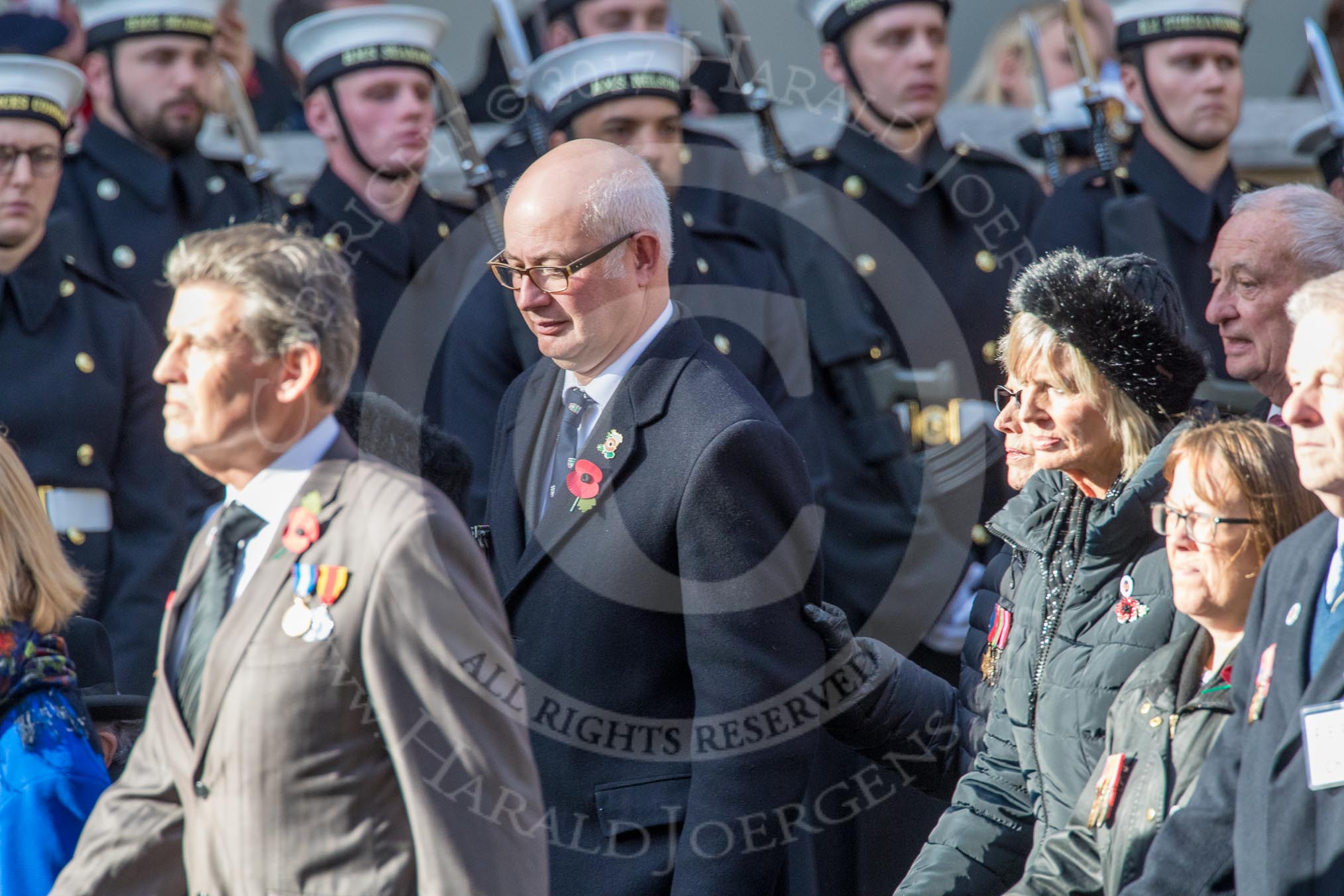 Children (and Families) of Far East Prisoners of War (Group M2, 59 members) during the Royal British Legion March Past on Remembrance Sunday at the Cenotaph, Whitehall, Westminster, London, 11 November 2018, 12:25.