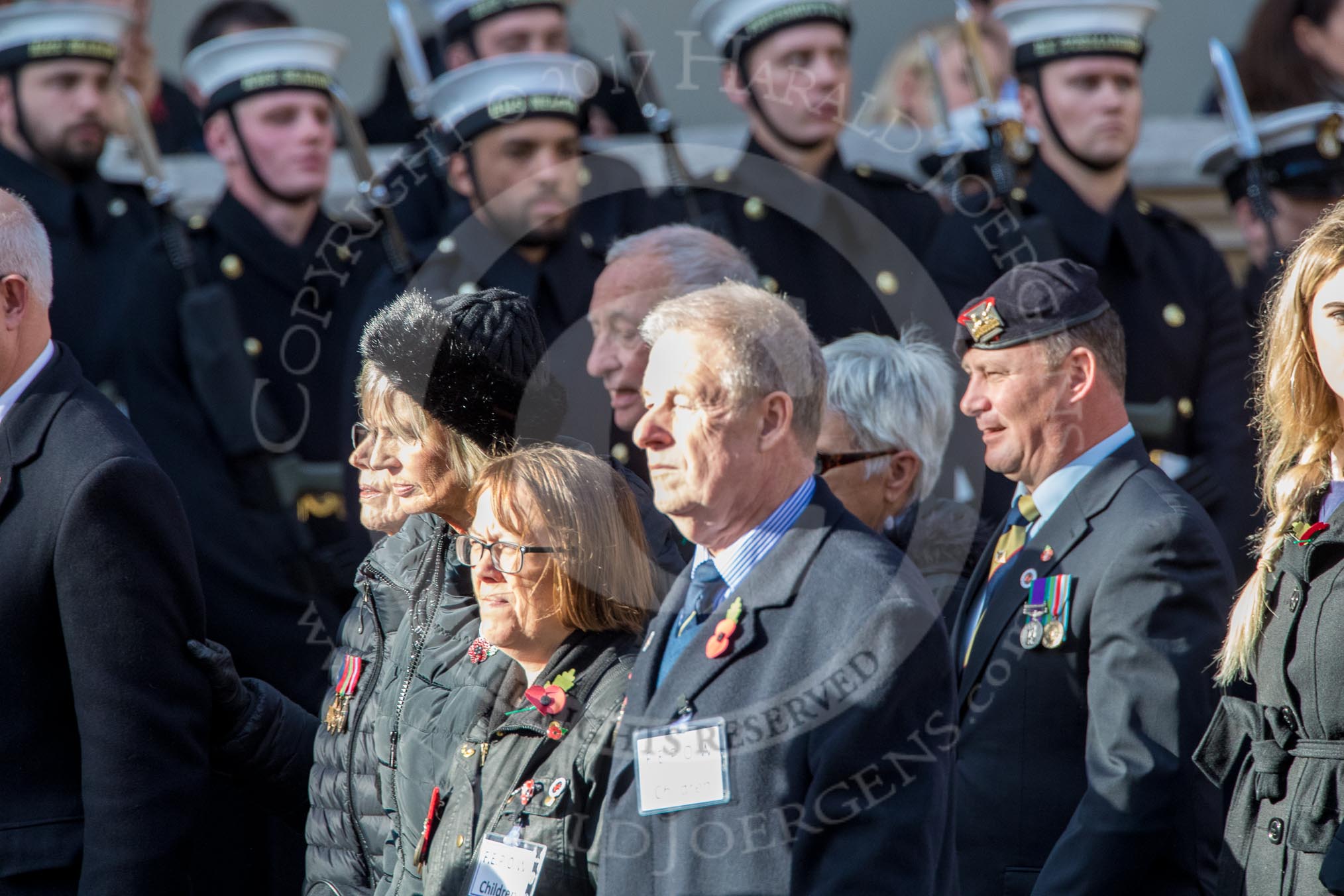 Children (and Families) of Far East Prisoners of War (Group M2, 59 members) during the Royal British Legion March Past on Remembrance Sunday at the Cenotaph, Whitehall, Westminster, London, 11 November 2018, 12:25.