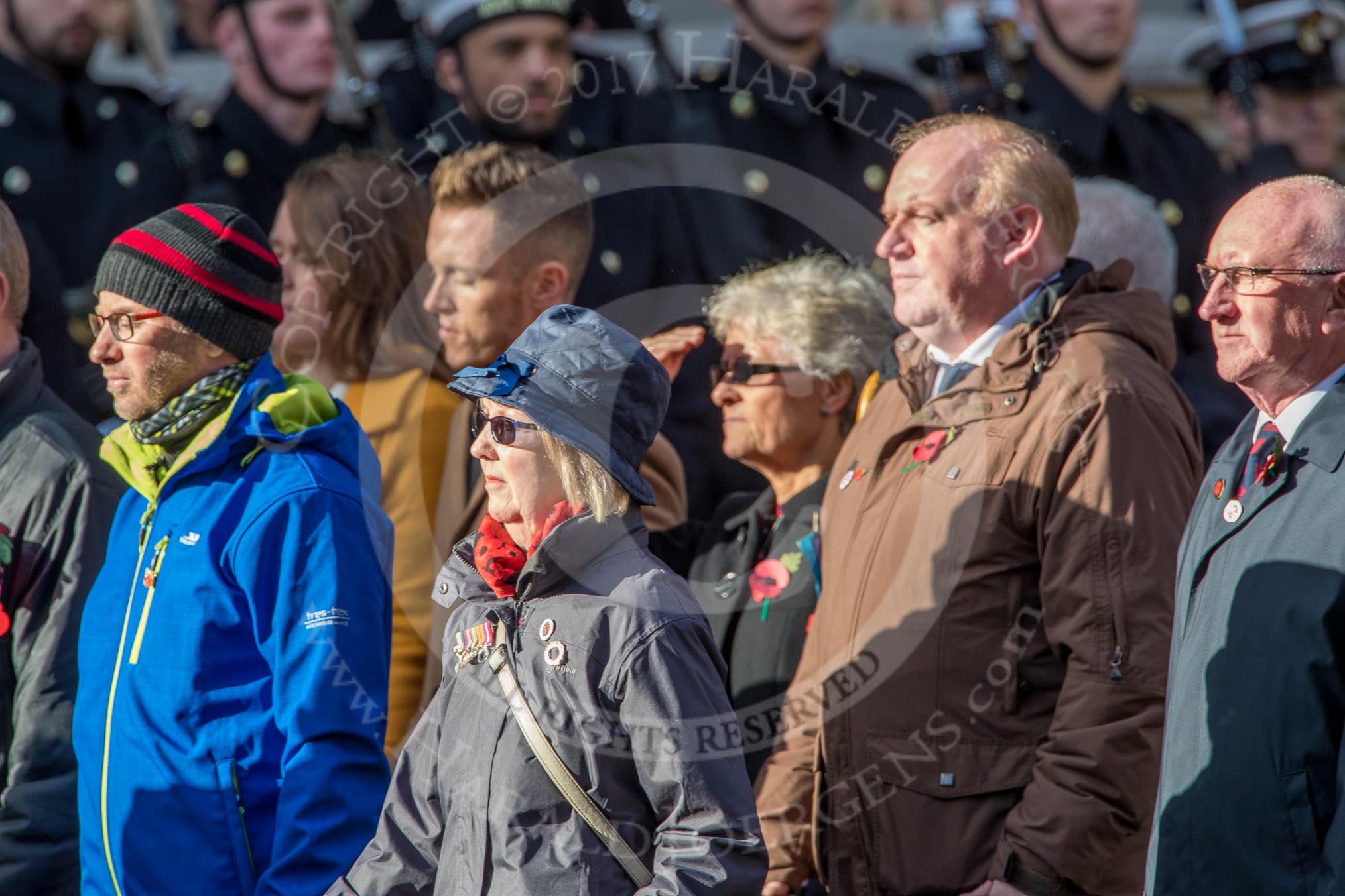 Children (and Families) of Far East Prisoners of War (Group M2, 59 members) during the Royal British Legion March Past on Remembrance Sunday at the Cenotaph, Whitehall, Westminster, London, 11 November 2018, 12:25.