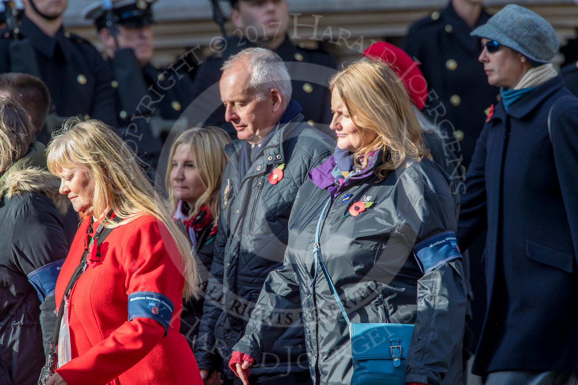 Munitions Workers Association (Group M3, 21 members) during the Royal British Legion March Past on Remembrance Sunday at the Cenotaph, Whitehall, Westminster, London, 11 November 2018, 12:25.