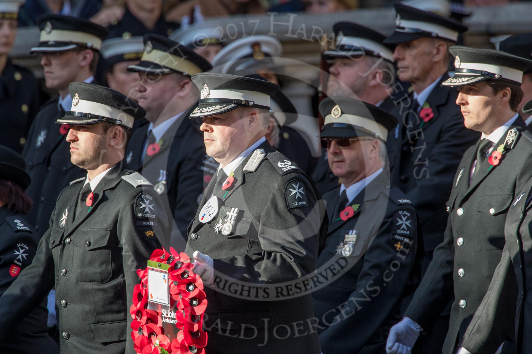 St John Ambulance (Group M12, 25 members) during the Royal British Legion March Past on Remembrance Sunday at the Cenotaph, Whitehall, Westminster, London, 11 November 2018, 12:26.