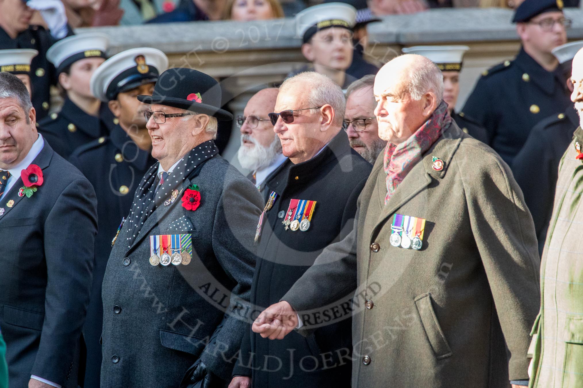 The Firefighters Memorial Trust (Group M16, 25 members) during the Royal British Legion March Past on Remembrance Sunday at the Cenotaph, Whitehall, Westminster, London, 11 November 2018, 12:26.