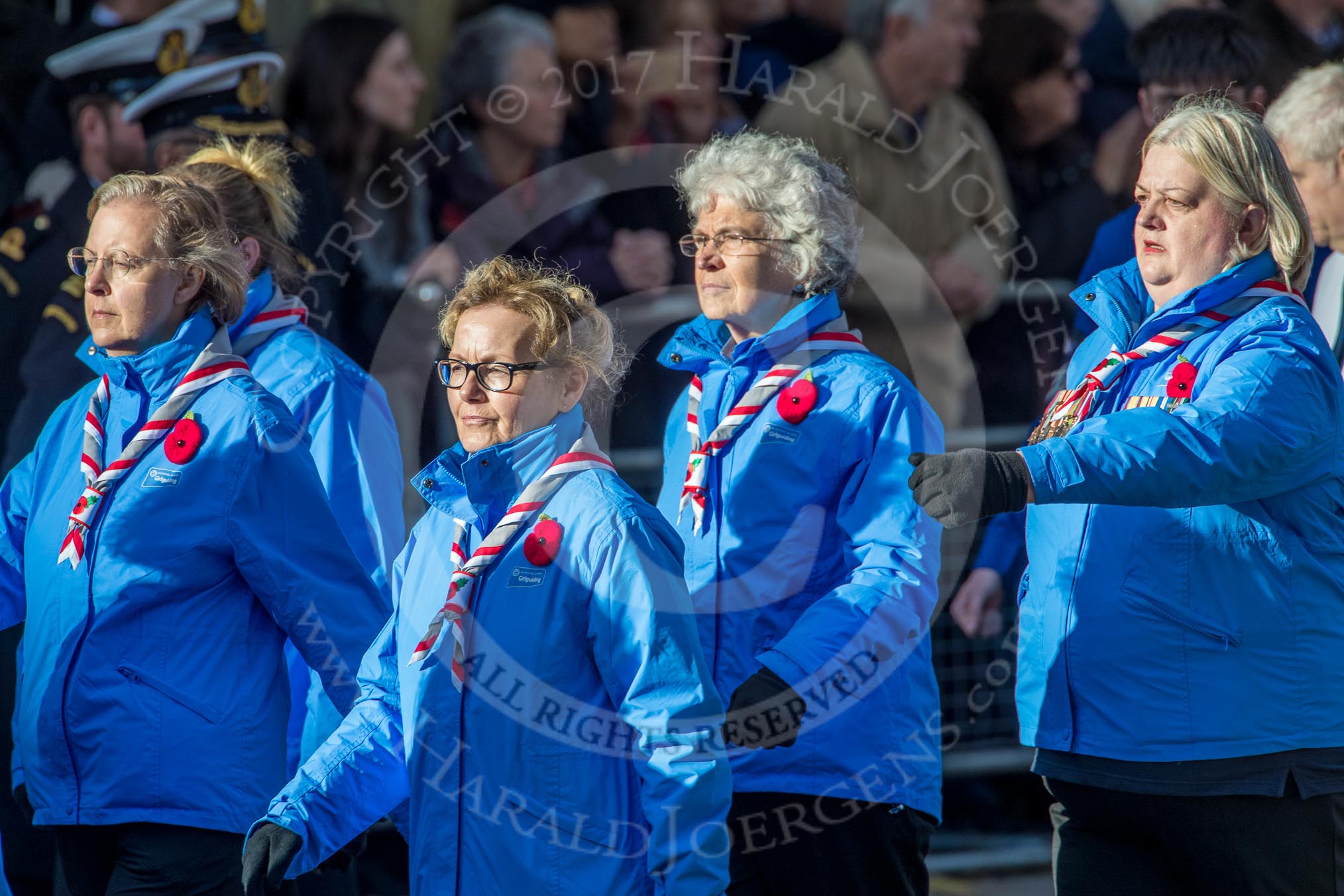 Girlguiding London and South East England(Group M38, 40 members) during the Royal British Legion March Past on Remembrance Sunday at the Cenotaph, Whitehall, Westminster, London, 11 November 2018, 12:30.