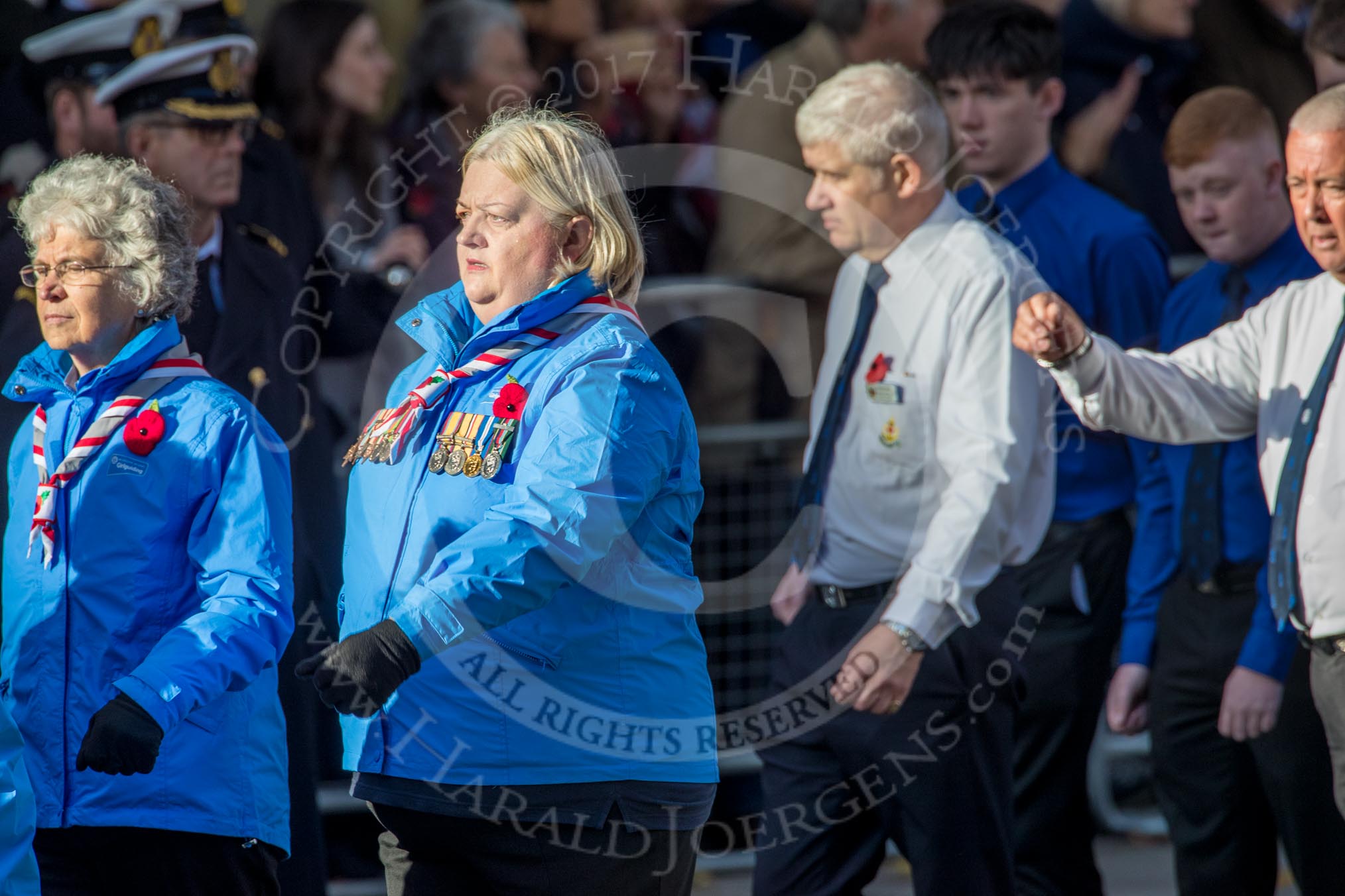 Girlguiding London and South East England(Group M38, 40 members) during the Royal British Legion March Past on Remembrance Sunday at the Cenotaph, Whitehall, Westminster, London, 11 November 2018, 12:30.