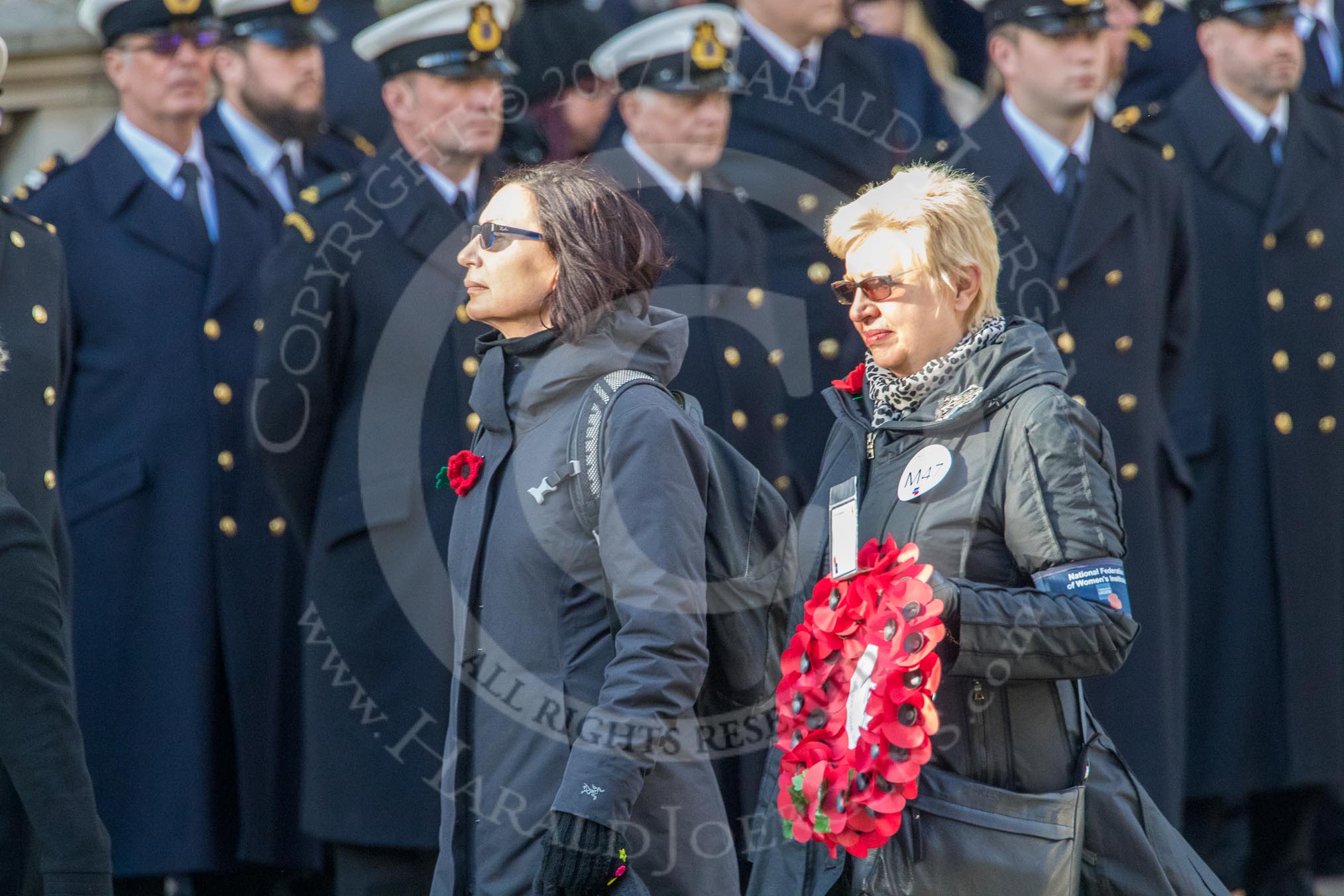 The NFWI - National Federation of Women's Institutes (Group M47, 4 members) during the Royal British Legion March Past on Remembrance Sunday at the Cenotaph, Whitehall, Westminster, London, 11 November 2018, 12:31.