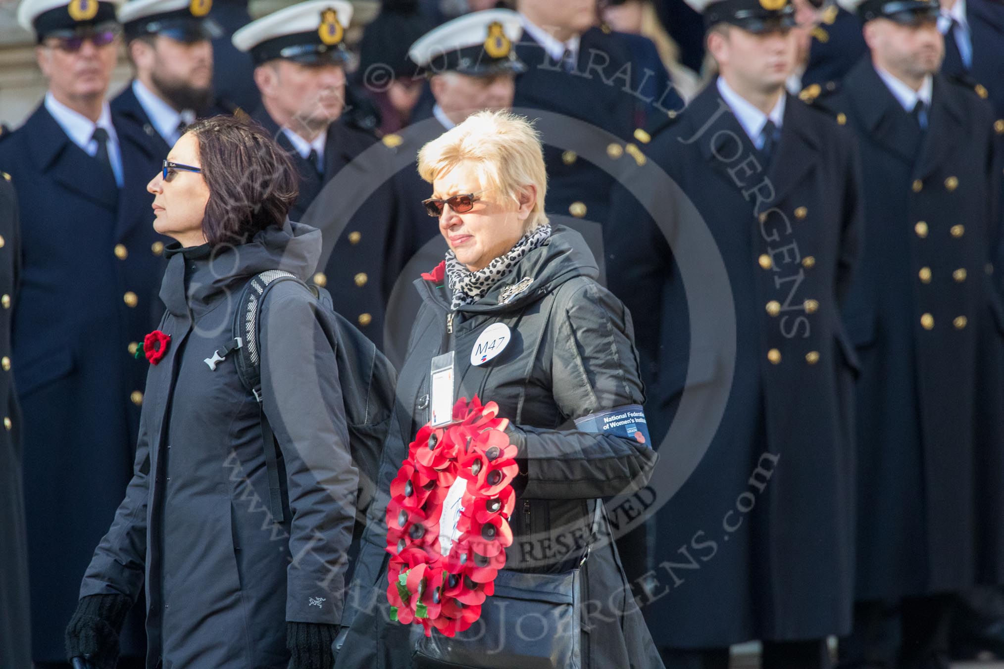 The NFWI - National Federation of Women's Institutes (Group M47, 4 members) during the Royal British Legion March Past on Remembrance Sunday at the Cenotaph, Whitehall, Westminster, London, 11 November 2018, 12:31.