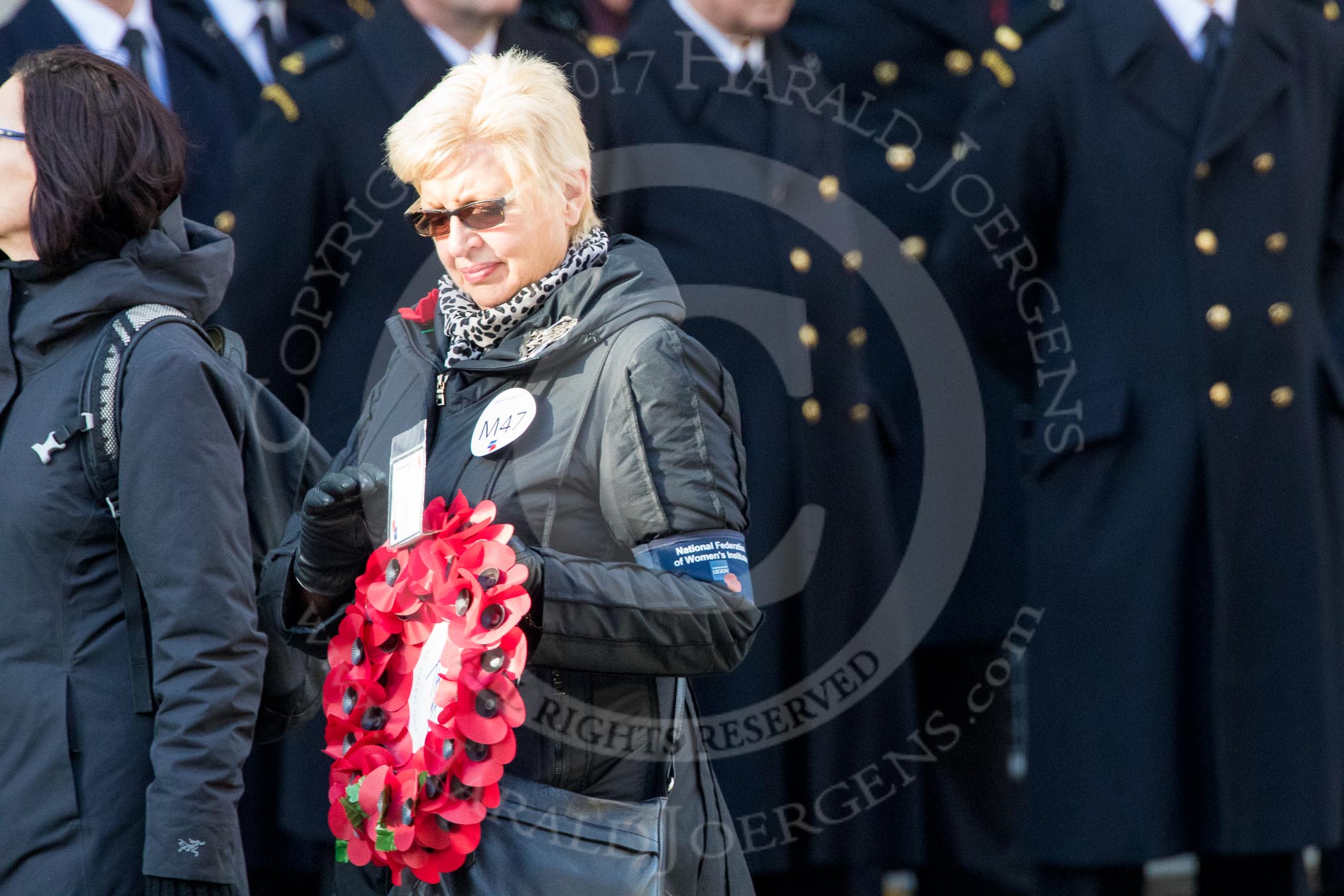 The NFWI - National Federation of Women's Institutes (Group M47, 4 members) during the Royal British Legion March Past on Remembrance Sunday at the Cenotaph, Whitehall, Westminster, London, 11 November 2018, 12:31.