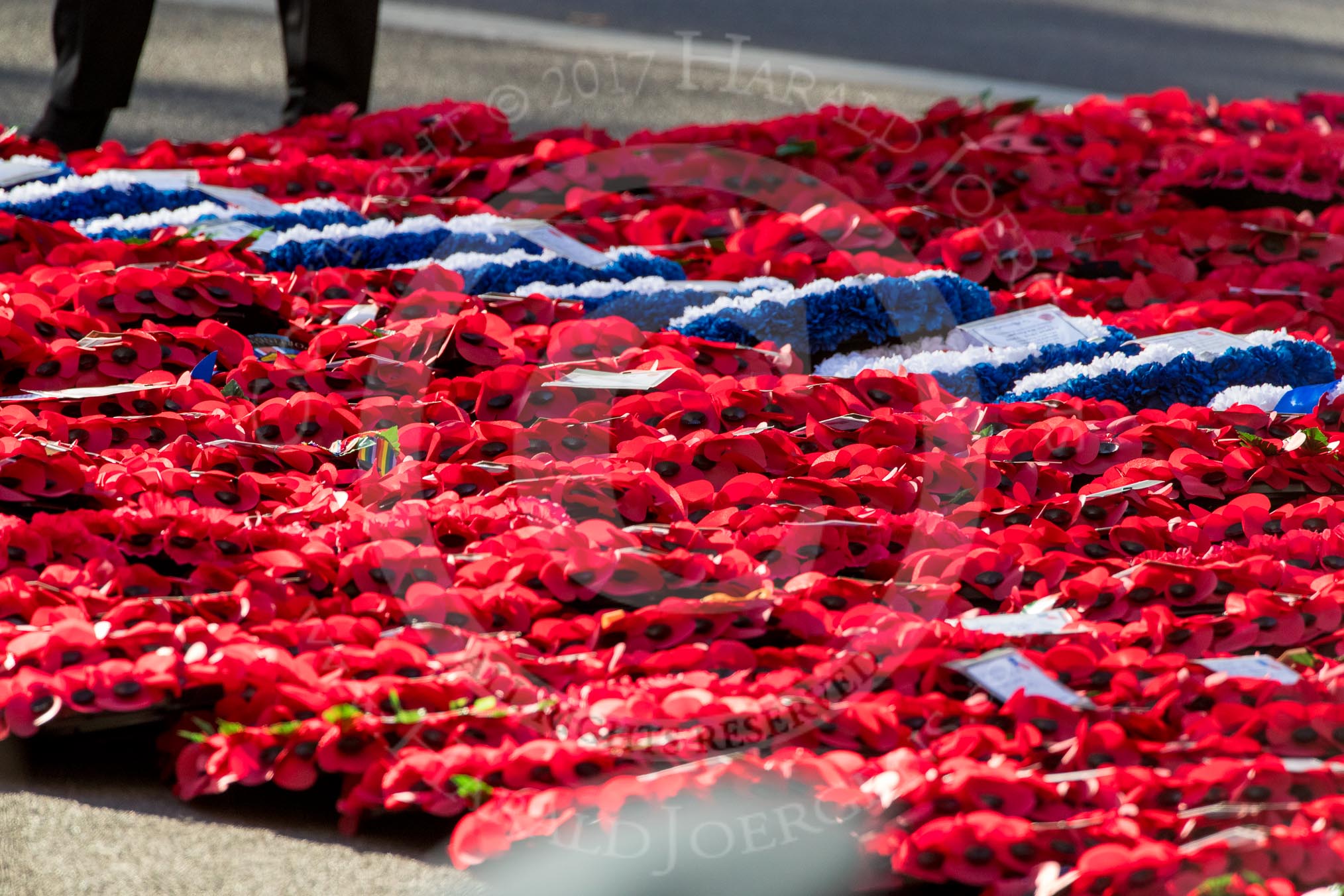 A sea of wreaths at the Cenotaph after the the Royal British Legion March Past on Remembrance Sunday at the Cenotaph, Whitehall, Westminster, London, 11 November 2018, 12:33.