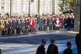 The first column of veterans is marching from Horse Guards Parade onto Whitehall before the Remembrance Sunday Cenotaph Ceremony 2018 at Horse Guards Parade, Westminster, London, 11 November 2018, 10:08.