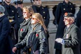 Munitions Workers Association (Group M3, 21 members) during the Royal British Legion March Past on Remembrance Sunday at the Cenotaph, Whitehall, Westminster, London, 11 November 2018, 12:25.
