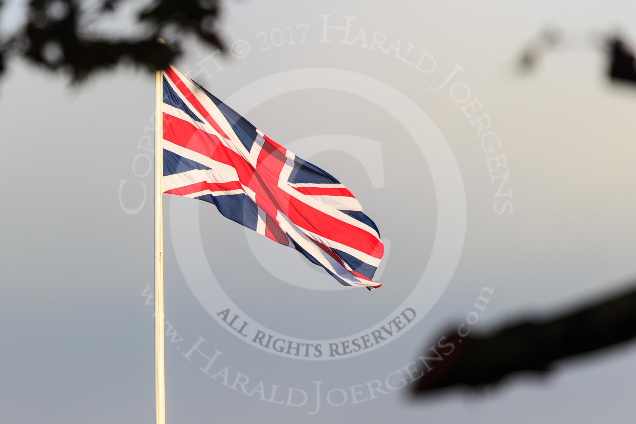 The Union Jack flying on the Foreign and Commonwealth Office as the weather clears before the Remembrance Sunday Cenotaph Ceremony 2018 at Horse Guards Parade, Westminster, London, 11 November 2018, 08:33.