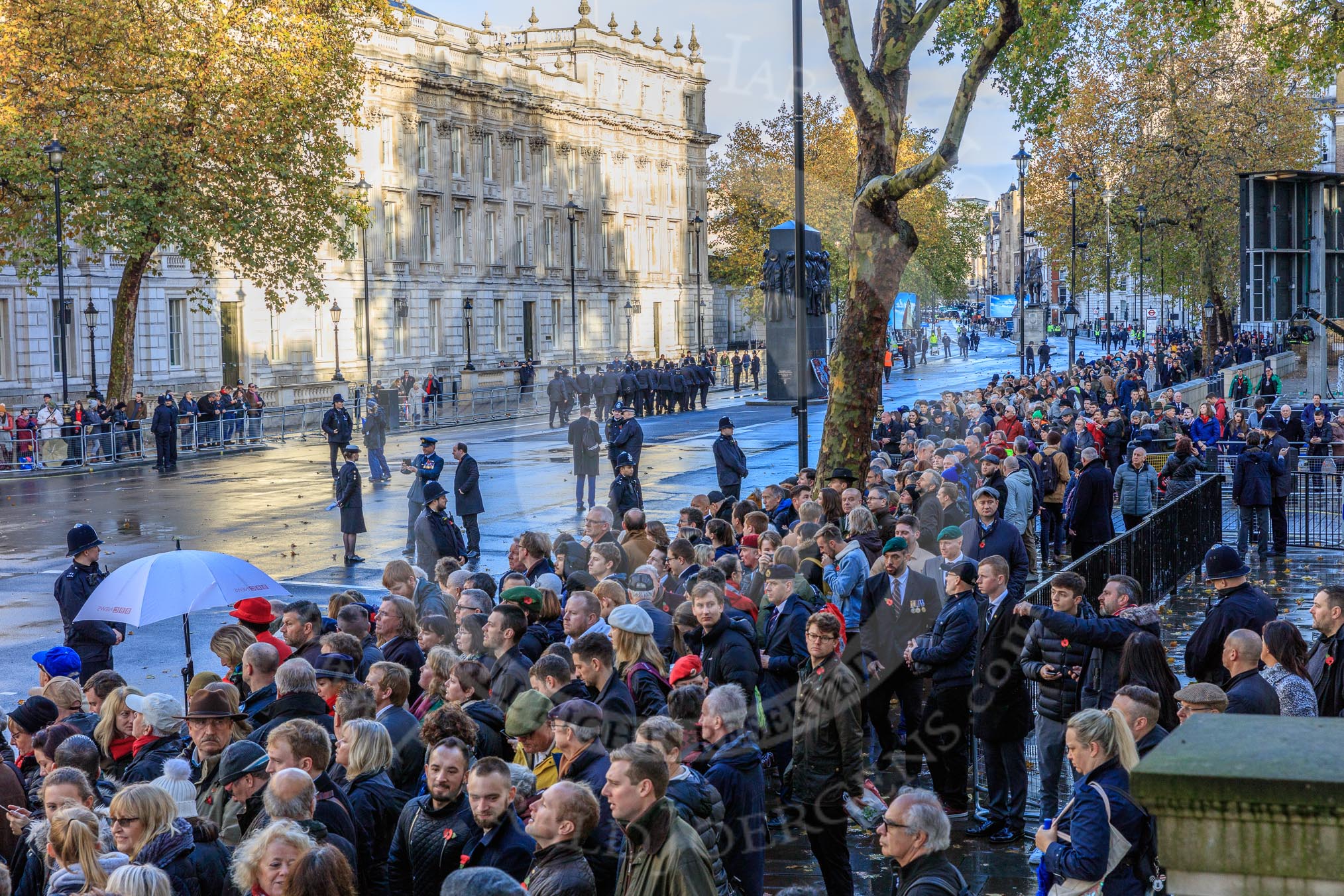 Crowds of spectators are building on on Whitehall before the   Remembrance Sunday Cenotaph Ceremony 2018 at Horse Guards Parade, Westminster, London, 11 November 2018, 08:39.
