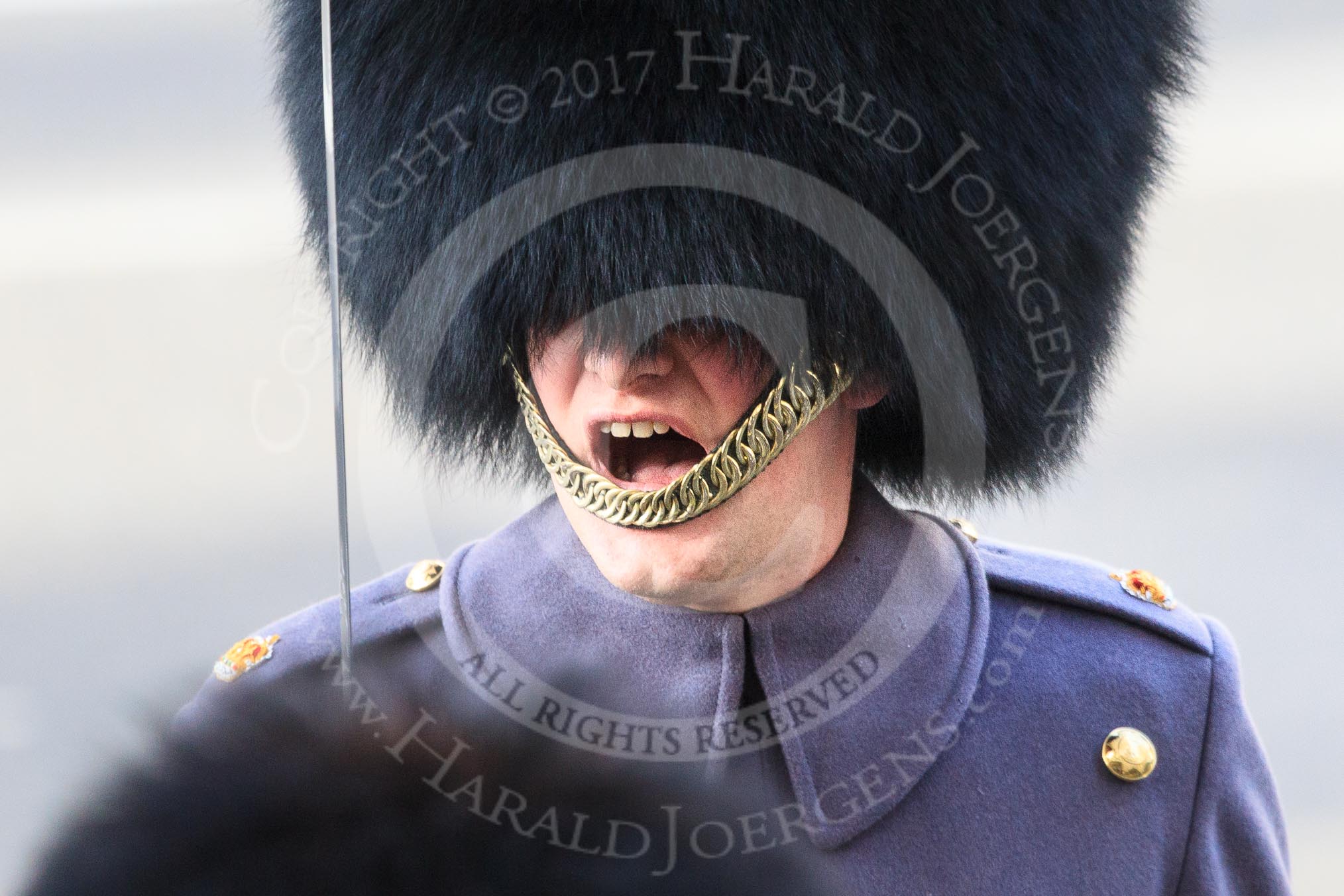 A Coldstream Guards Major commands his group of the Service detachment from the Army before the Remembrance Sunday Cenotaph Ceremony 2018 at Horse Guards Parade, Westminster, London, 11 November 2018, 10:27.