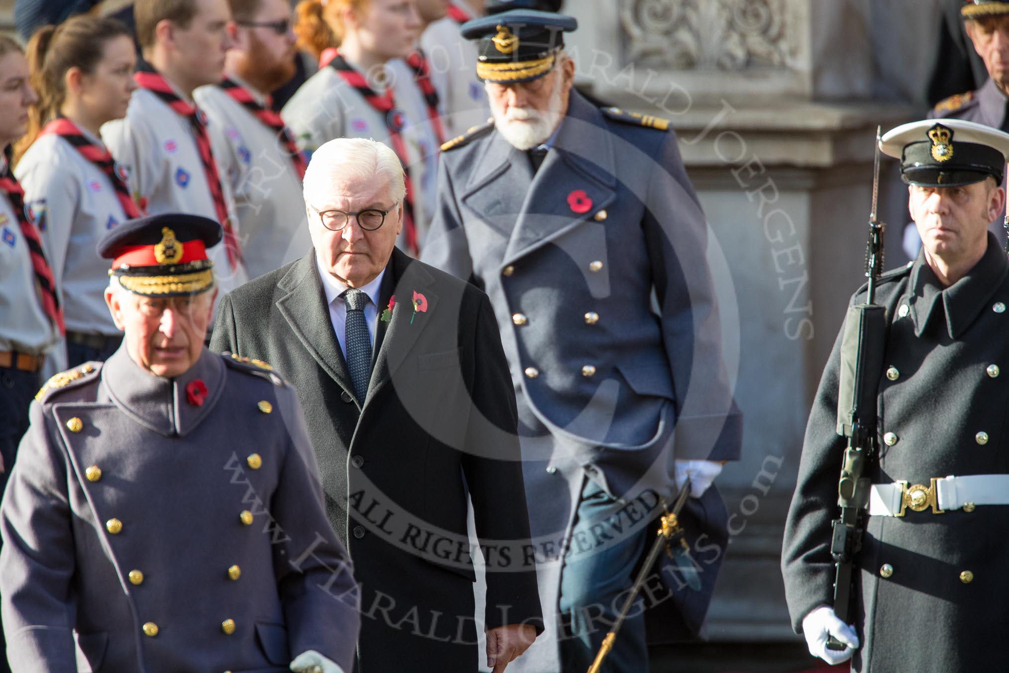 HE The President of the Federal Republic of Germany, Frank-Walter Steinmeier, in focus, between HRH The Prince of Wales (Prince Charles) and HRH The Duke of Kent (Prince Edward) during the Remembrance Sunday Cenotaph Ceremony 2018 at Horse Guards Parade, Westminster, London, 11 November 2018, 10:58.