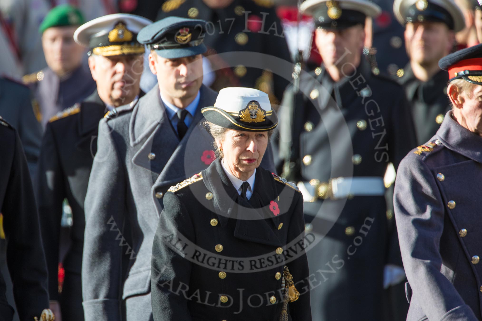 HRH The Princess Royal (Princess Anne), followed by HRH The Duke of Cambridge (Prince William) and HRH The Duke of York (Prince Andrew) during the Remembrance Sunday Cenotaph Ceremony 2018 at Horse Guards Parade, Westminster, London, 11 November 2018, 10:59.