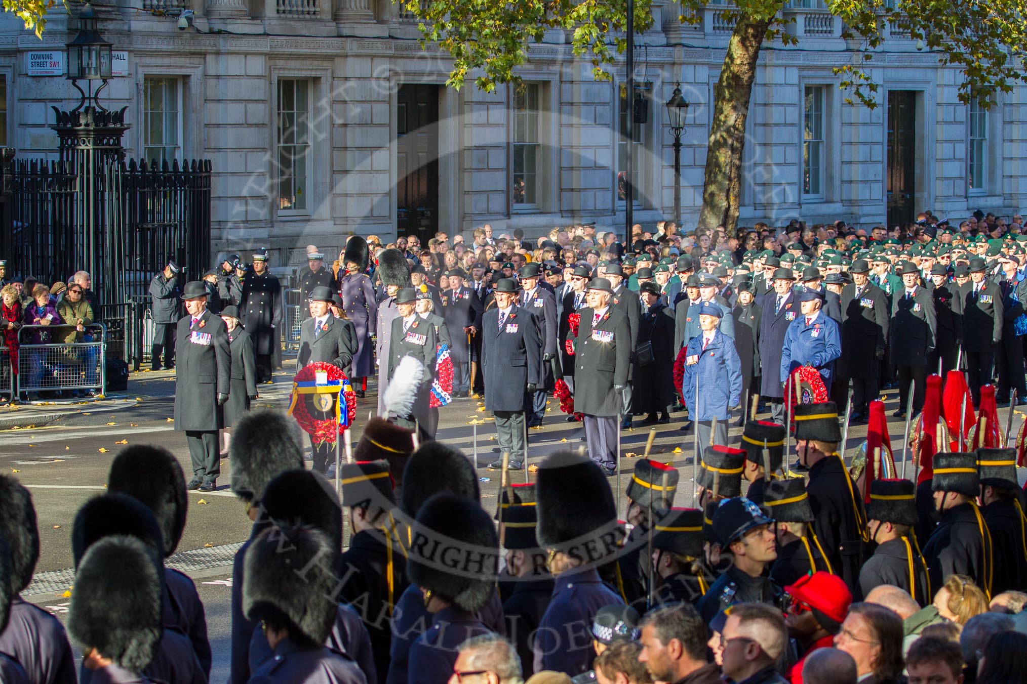 Representatives of The Royal British Legion, London Transport, the Royal Air Forces Association , the Royal Naval Association , the Royal Commonwealth Ex-­Services League, the Royal British Legion Scotland, and the Royal British Legion Women's Section waiting to lay their wreaths at the Cenotaph during the Remembrance Sunday Cenotaph Ceremony 2018 at Horse Guards Parade, Westminster, London, 11 November 2018, 11:26.