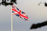 The Union Jack flying on the Foreign and Commonwealth Office as the weather clears before the Remembrance Sunday Cenotaph Ceremony 2018 at Horse Guards Parade, Westminster, London, 11 November 2018, 08:33.