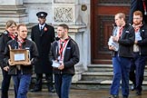 The The Queen's Scouts leaving the Foreign and Commonwealth Office to distribute the Order of Service in Whitehall before Remembrance Sunday Cenotaph Ceremony 2018 at Horse Guards Parade, Westminster, London, 11 November 2018, 09:13.
