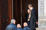 An unidentified man and woman at the door of the Foreign and Commonwealth Office before the Remembrance Sunday Cenotaph Ceremony 2018 at Horse Guards Parade, Westminster, London, 11 November 2018, 09:47.