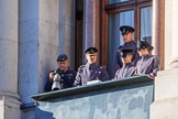 Army officers and an army photographer in one of the top floor windows of the Foreign and Commonwealth Office before the Remembrance Sunday Cenotaph Ceremony 2018 at Horse Guards Parade, Westminster, London, 11 November 2018, 09:52. I believe they control all or parts of the event - if you know more, please let me know!