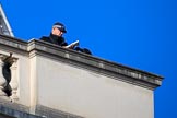 A police officer on the roof of the Foreign and Commonwealth Office before the Remembrance Sunday Cenotaph Ceremony 2018 at Horse Guards Parade, Westminster, London, 11 November 2018, 09:58.