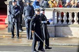 Two Royal Navy officers arriving on Whitehall ahead of their service detachment, before the Remembrance Sunday Cenotaph Ceremony 2018 at Horse Guards Parade, Westminster, London, 11 November 2018, 10:07.