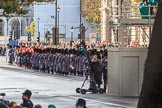 More army service detachments arriving on Whitehall before the Remembrance Sunday Cenotaph Ceremony 2018 at Horse Guards Parade, Westminster, London, 11 November 2018, 10:24. They all march from  Wellington Barracks via Birdcage Walk, Great George Street and Parliament Street to the Cenotaph