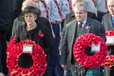 The Rt Hon Theresa May MP, Prime Minister, on behalf of the Government, and Mr Ian Blackford MP (the Westminster Scottish National Party Leader on the behalf of the SNP/the Plaid Cymru Parliamentary Group)  leaving the Foreign and Commonwealth Office with their wreaths during Remembrance Sunday Cenotaph Ceremony 2018 at Horse Guards Parade, Westminster, London, 11 November 2018, 10:55.