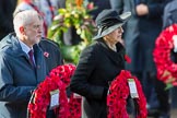 The Rt Hon Jeremy Corbyn MP, (Leader of the Labour Party and Leader of the Opposition)   and The Rt Hon Theresa May MP, Prime Minister, on behalf of the Government with their wreaths during the Remembrance Sunday Cenotaph Ceremony 2018 at Horse Guards Parade, Westminster, London, 11 November 2018, 10:55.