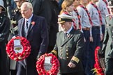Mr Christopher Garrod, Air Transport Auxiliary Association  and Captain David Johnstone, Merchant Navy leaving the Foreign and Commonwealth Office with their wreaths during the Remembrance Sunday Cenotaph Ceremony 2018 at Horse Guards Parade, Westminster, London, 11 November 2018, 10:55.