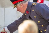 HRH The Prince of Wales (Prince Charles) lays a wreath on behalf of HM The Queen during the Remembrance Sunday Cenotaph Ceremony 2018 at Horse Guards Parade, Westminster, London, 11 November 2018, 11:04.