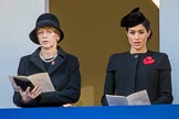 Mrs. Elke Büdenbender, wife of HE The President of the Federal Republic of Germany, Frank-Walter Steinmeier and HRH The Duchess of Sussex (Meghan), singing, on the balcony of the Foreign and Commonwealth Office during the Remembrance Sunday Cenotaph Ceremony 2018 at Horse Guards Parade, Westminster, London, 11 November 2018, 11:18.