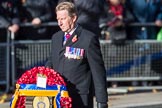 Air Marshal David Walker CB CBE AFC MA RAF (Retired), National President of the Royal British Legion, with the legion's wreath on the way to the Cenotaph during the  Remembrance Sunday Cenotaph Ceremony 2018 at Horse Guards Parade, Westminster, London, 11 November 2018, 11:28.