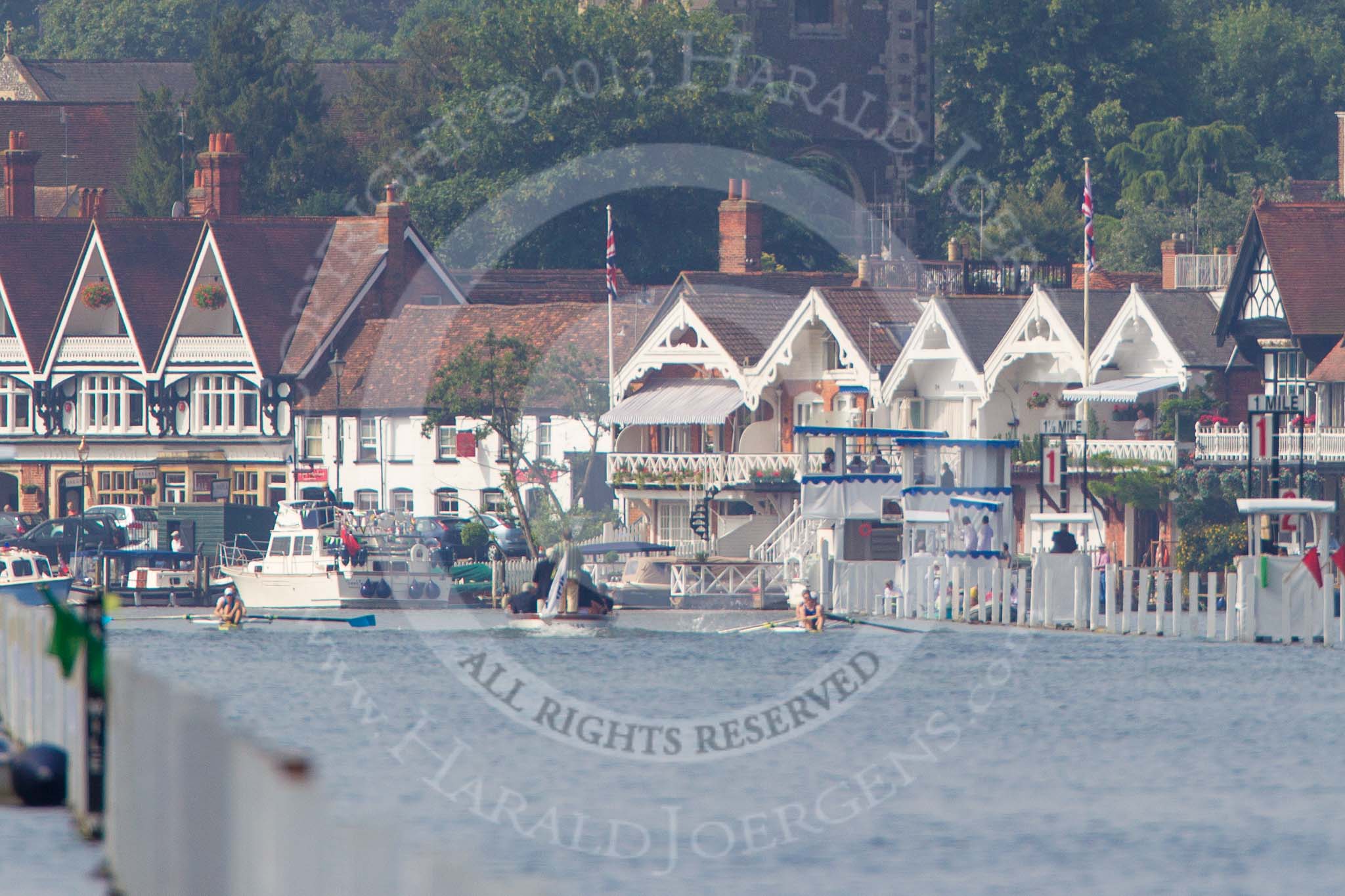 Henley Royal Regatta 2013, Saturday: The first of the Saturday races. For the Britannia Challenge Cup - RTHC Bayer Leverkusen, Germany, and Taurus Boat Club 'A' close to the finish line - Taurus to win with 1 3/4 length. Image #75, 06 July 2013 10:05 River Thames, Henley on Thames, UK